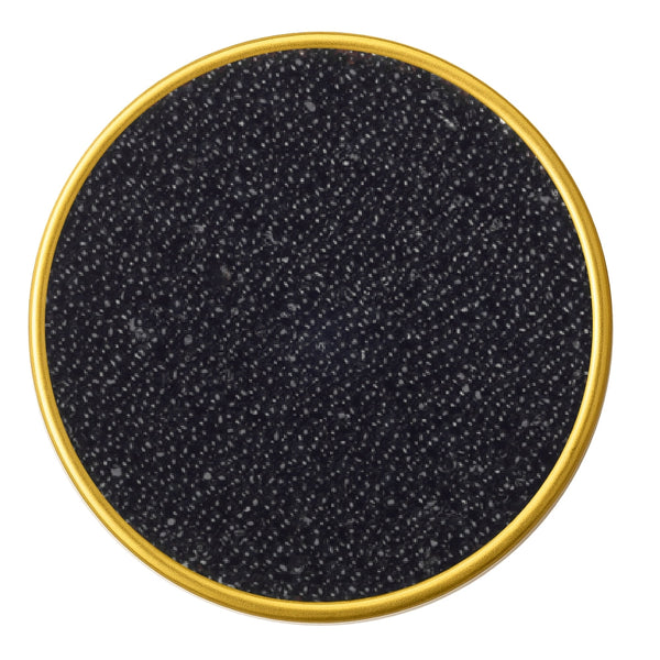 Close-up of Canadian black pike roe caviar in a container on a white background