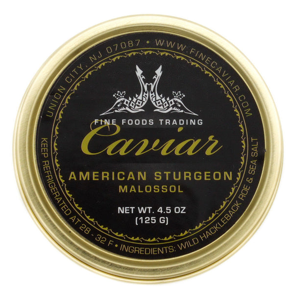 A tin can of American Sturgeon Caviar Container with black and gold label, net weight 4.5 oz. (125 g). View from top.