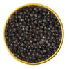 Close-up of a container with American White Sturgeon Malossol Black Caviar on a white background