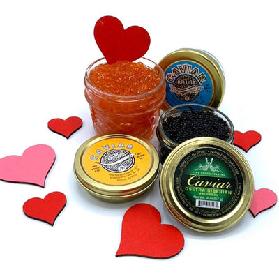 Assorted caviar jars with decorative heart shapes on a white background